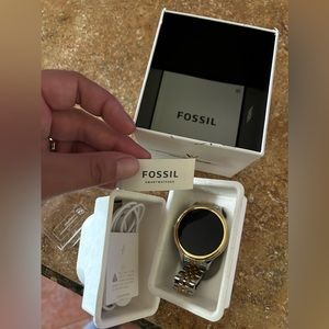 Smartwatch.New with tags Fossil Watch OS by google for for iPhone or Android.